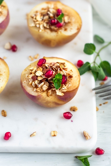 Baked peaches on a serving tray