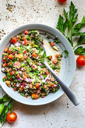 Tabbouleh Quinoa Salad in grey plate