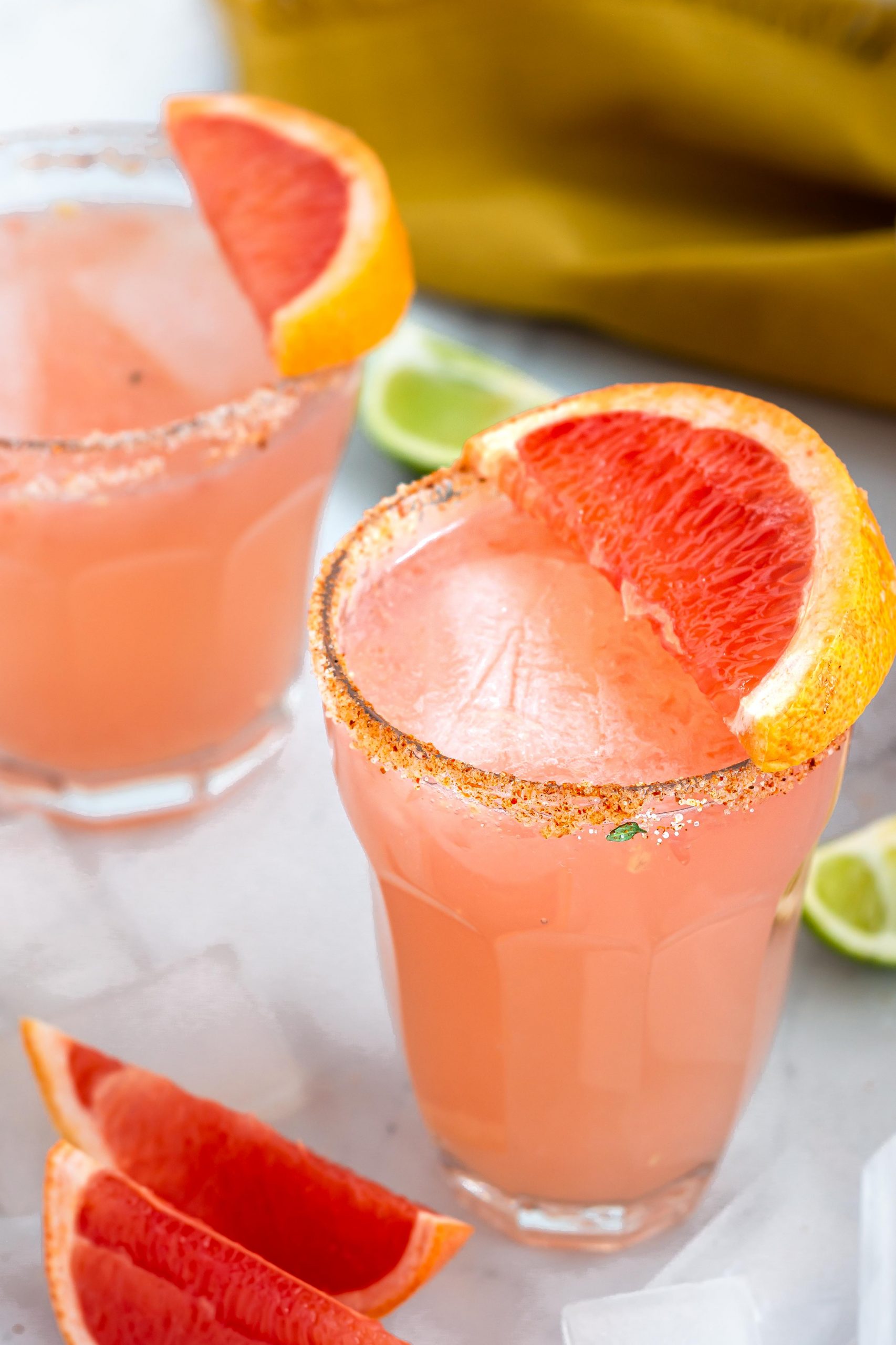 paloma cocktail in a glass with grapefruit slice on top