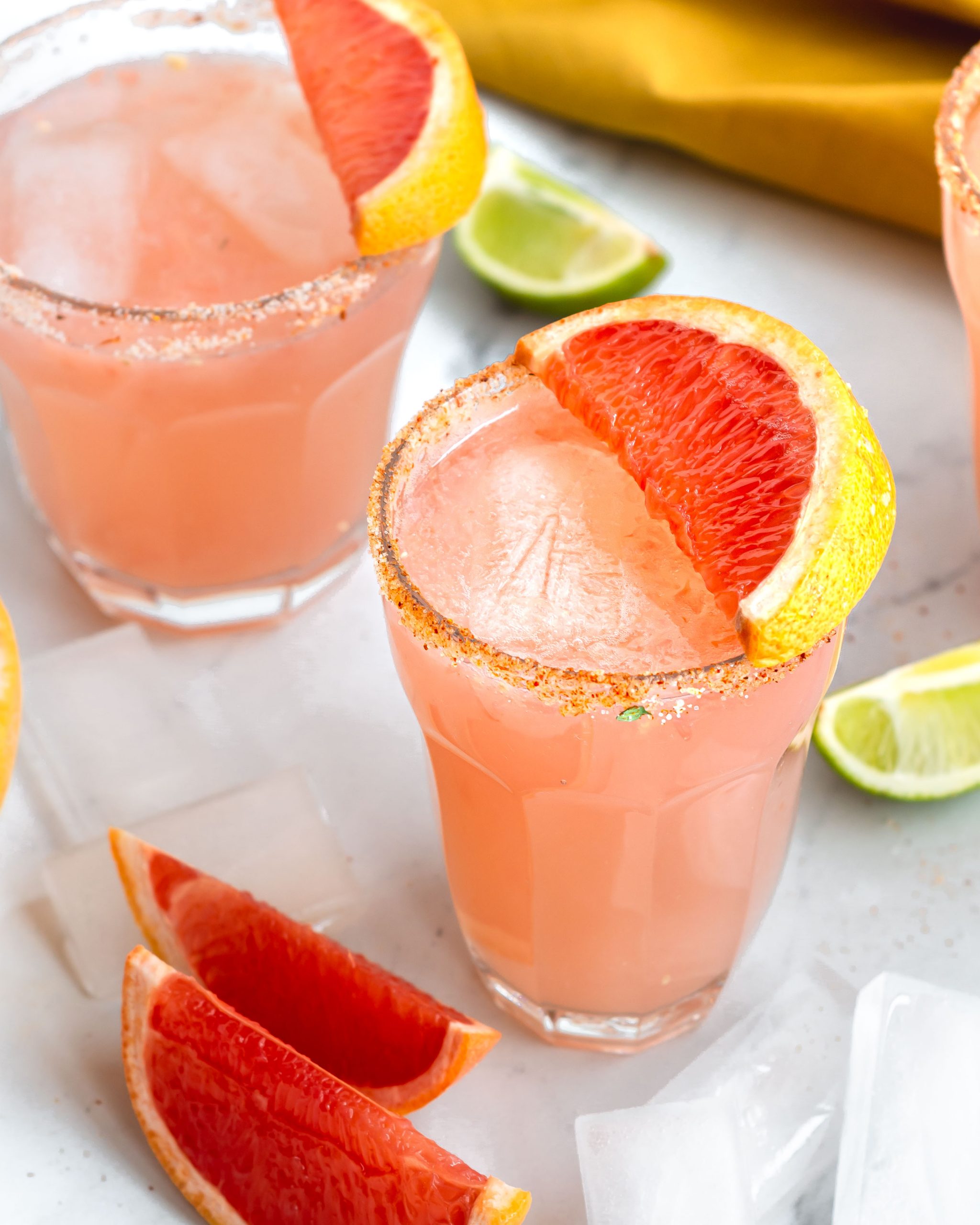 paloma drink with grapefruit slice as garnish.