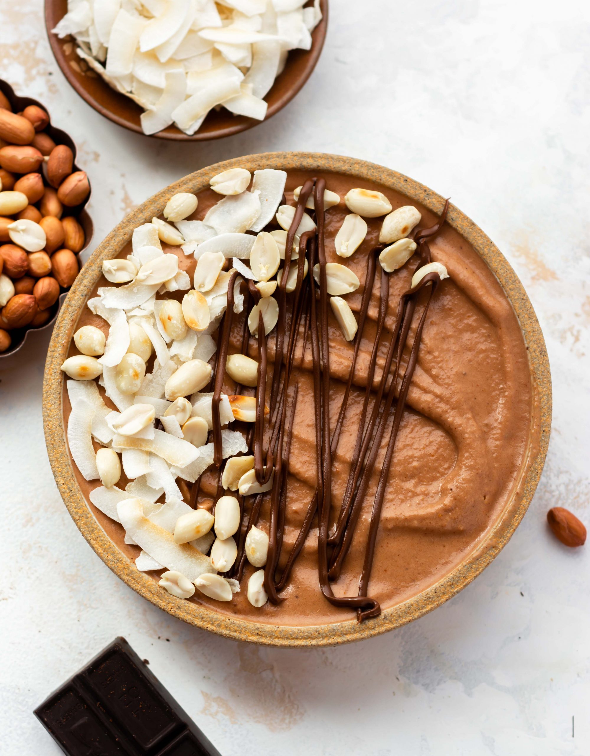 chocolate smoothie in a bowl with toppings