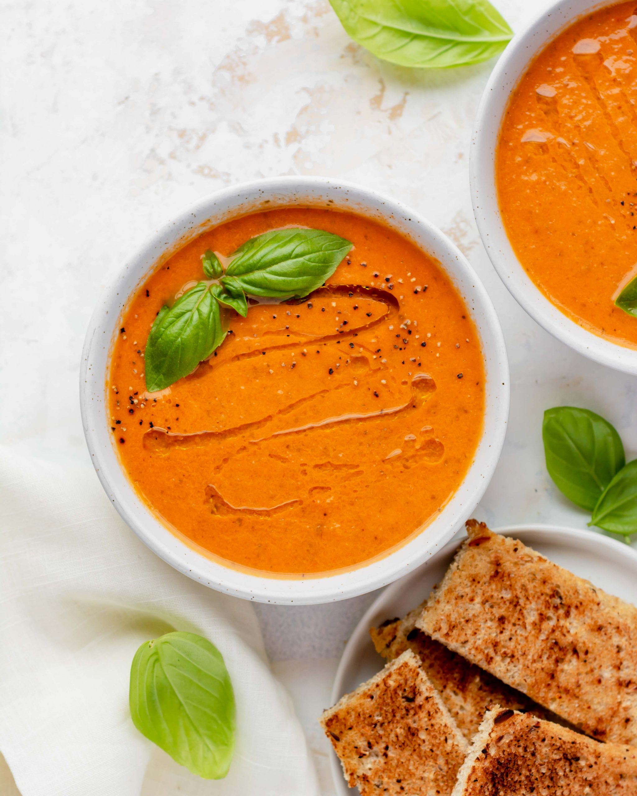 vegan roasted tomato basil soup in a bowl