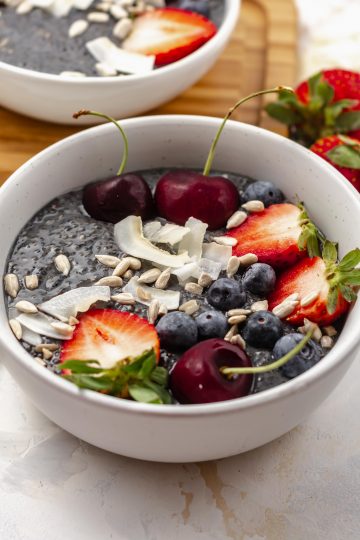 lemon blueberry chia pudding in a bowl with fruits
