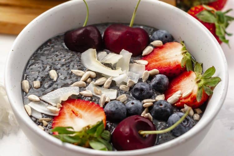 lemon blueberry chia pudding in a bowl with fruits